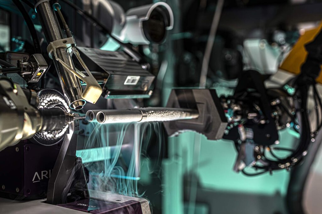Ein Probe wird mit einem Roboter an die richtige stelle positioniert